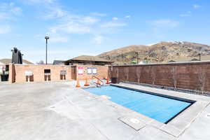 View of pool featuring a mountain view