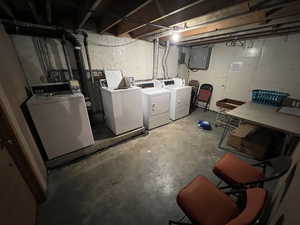 Unfinished below grade area with separate washer and dryer