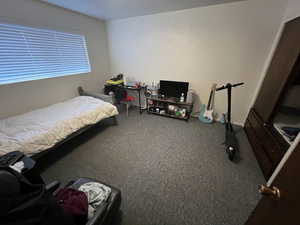 Bedroom featuring carpet flooring