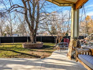 Fenced yard with a patio area