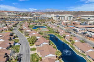 View of property location with a water and mountain view