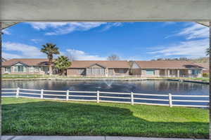 Water view featuring nearby suburban area