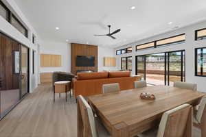 Dining area featuring ceiling fan, light wood-type flooring, and recessed lighting