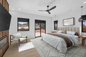 Bedroom with access to outside, light wood-style floors, a ceiling fan, and recessed lighting