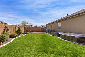 Fenced backyard featuring a patio area