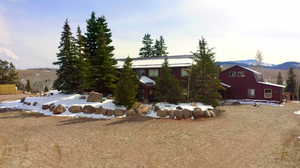 View of front of property featuring a mountain view