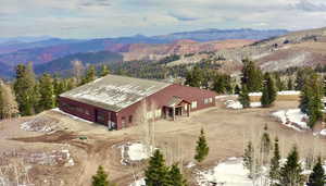 View from above of property featuring a mountain backdrop