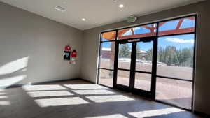 Entryway featuring recessed lighting and wood finished floors
