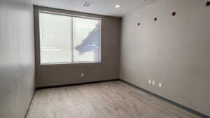 Spare room with light wood finished floors and baseboards