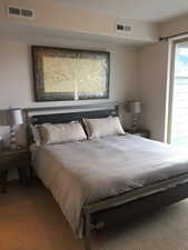 View of carpeted bedroom