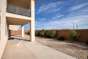 Fenced backyard featuring a patio