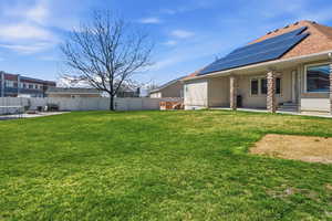 Fenced backyard featuring a patio area