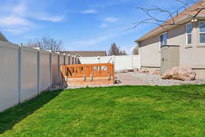 View of fenced backyard