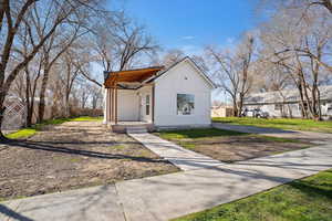 View of front of house with board and batten siding