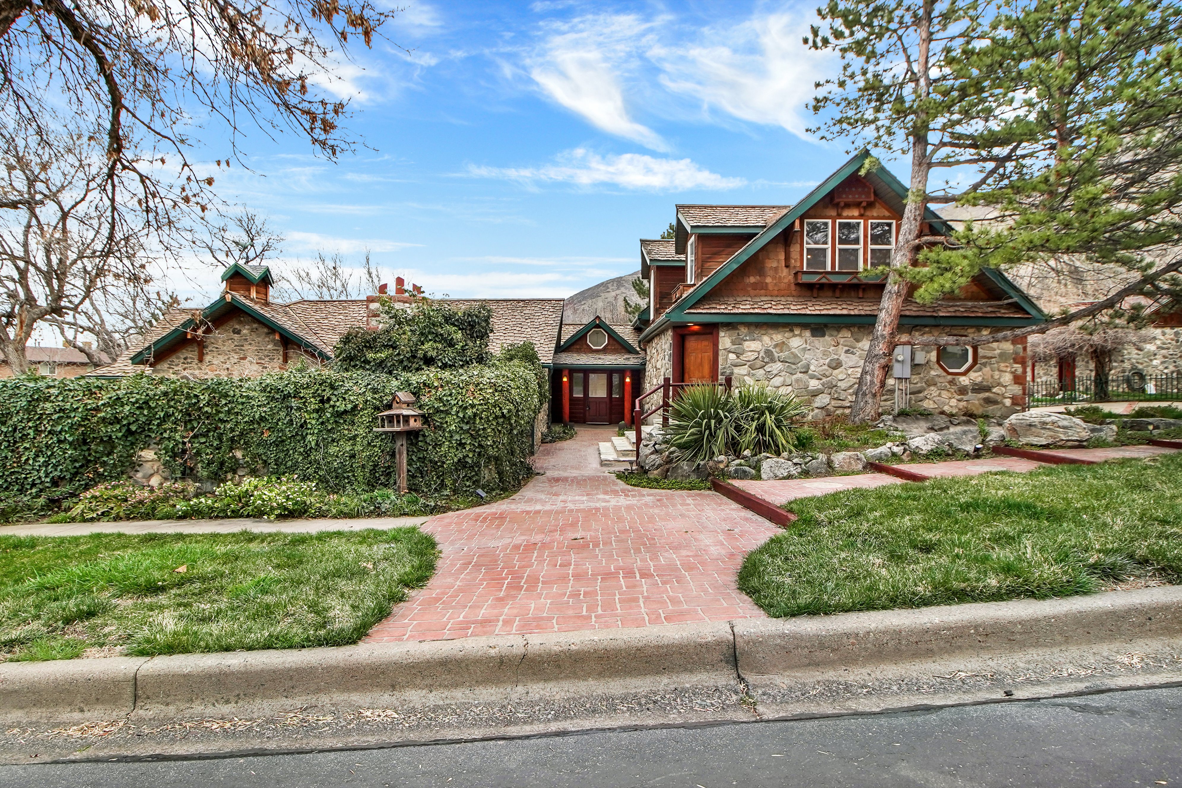 View of front of home featuring stone siding