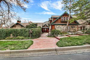 View of front of home featuring stone siding