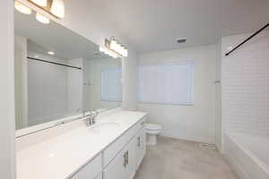 Full bathroom with vanity and shower / bath combination