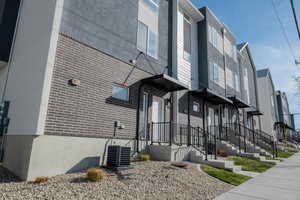 View of front facade featuring brick siding