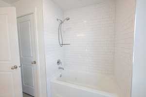 Bathroom featuring bathtub / shower combination
