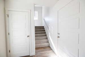 Staircase with wood finished floors