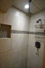 Bathroom view of a tile shower