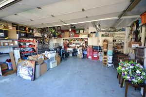 Garage featuring a workshop area