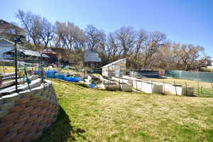 View of yard with an outdoor structure