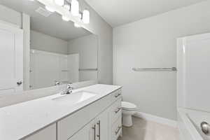 Bathroom featuring toilet and vanity