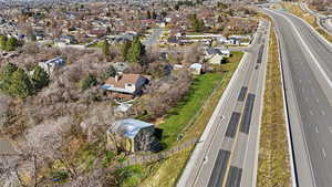 Aerial overview of property's location with nearby suburban area