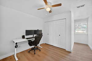 Office featuring light wood finished floors and ceiling fan