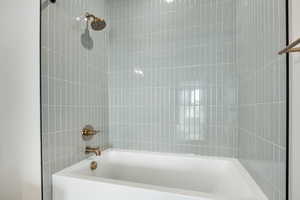 Bathroom with shower / tub combination