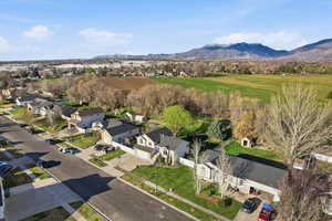 Aerial view of residential area featuring a mountain backdrop