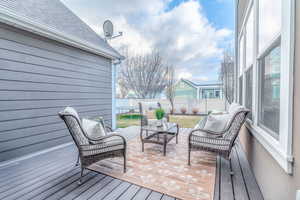Deck with an outdoor lounge area