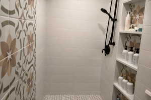 Bathroom with a stall shower