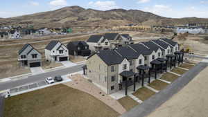 Aerial perspective of suburban area featuring mountains