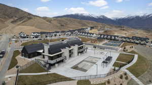 Aerial view of residential area with a mountain backdrop