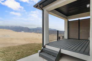View of patio / terrace with a mountain view