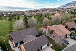 View from above of property featuring a mountainous background