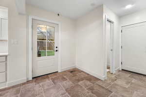 Doorway with stone finish flooring