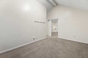 Carpeted empty room with baseboards