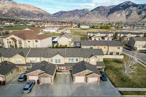 Aerial view of residential area with a mountain backdrop
