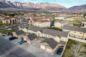 Aerial perspective of suburban area with a mountain backdrop
