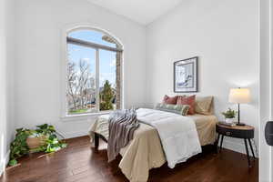 Bedroom with hardwood / wood-style floors