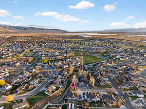 Aerial perspective of suburban area with a mountain backdrop