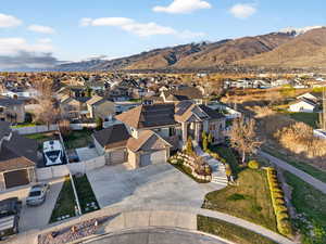 Aerial view of residential area with a mountain backdrop