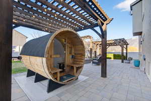 View of patio featuring a pergola