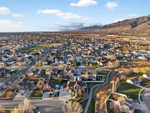 Aerial view of residential area with a mountainous background