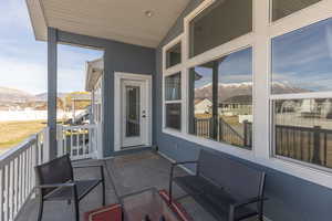 Balcony featuring a mountain view and an outdoor lounge area