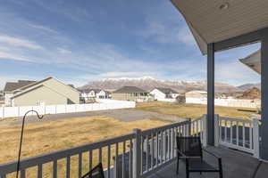 Balcony featuring a mountain view and a residential view