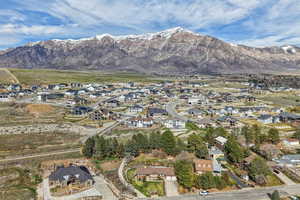 Aerial view of residential area featuring mountains